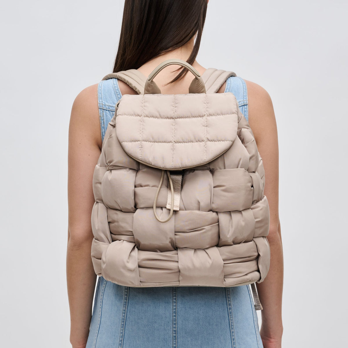Woman wearing Nude Sol and Selene Perception Backpack 841764107747 View 1 | Nude