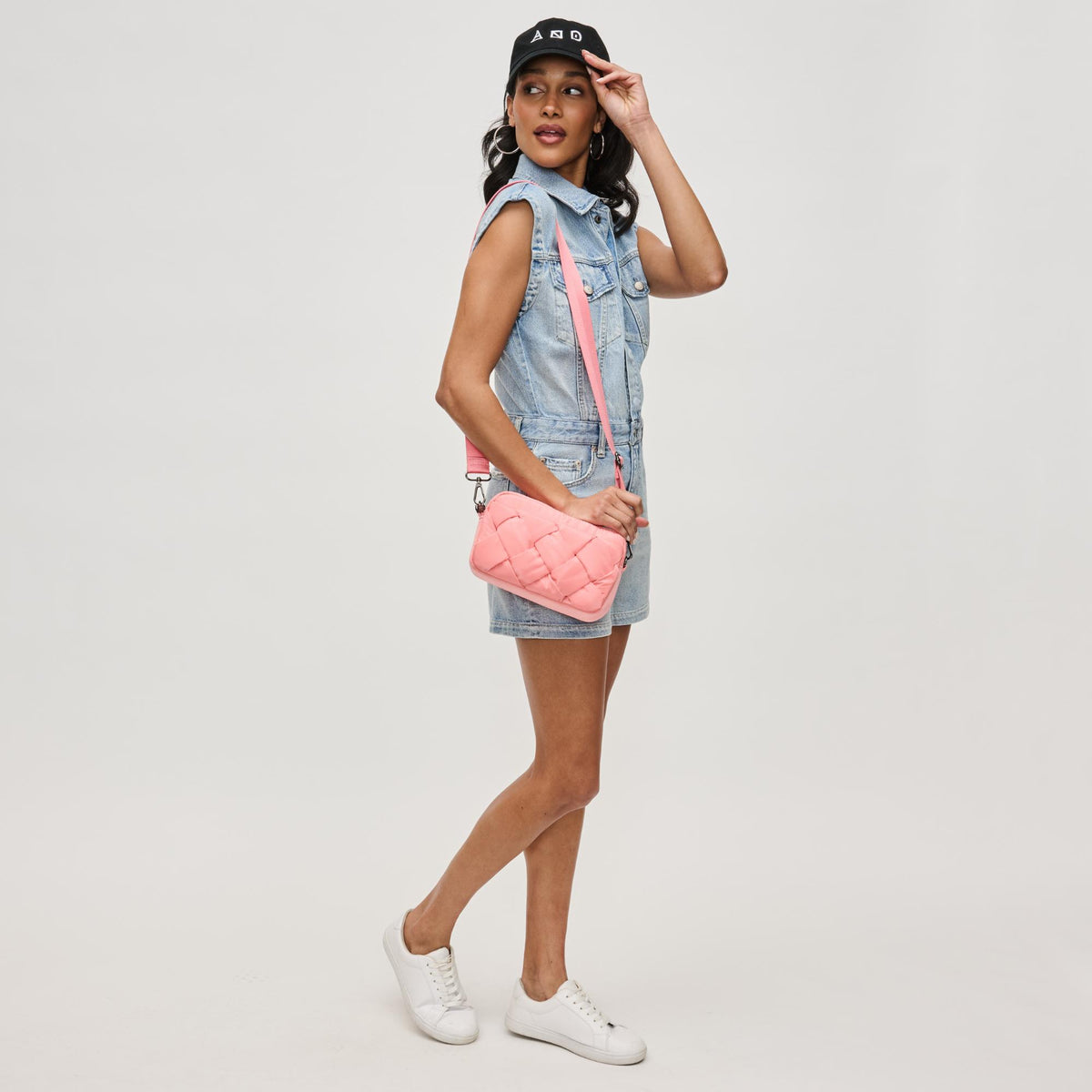 Woman wearing Salmon Sol and Selene Inspiration - Braided Woven Nylon Crossbody 841764111812 View 3 | Salmon