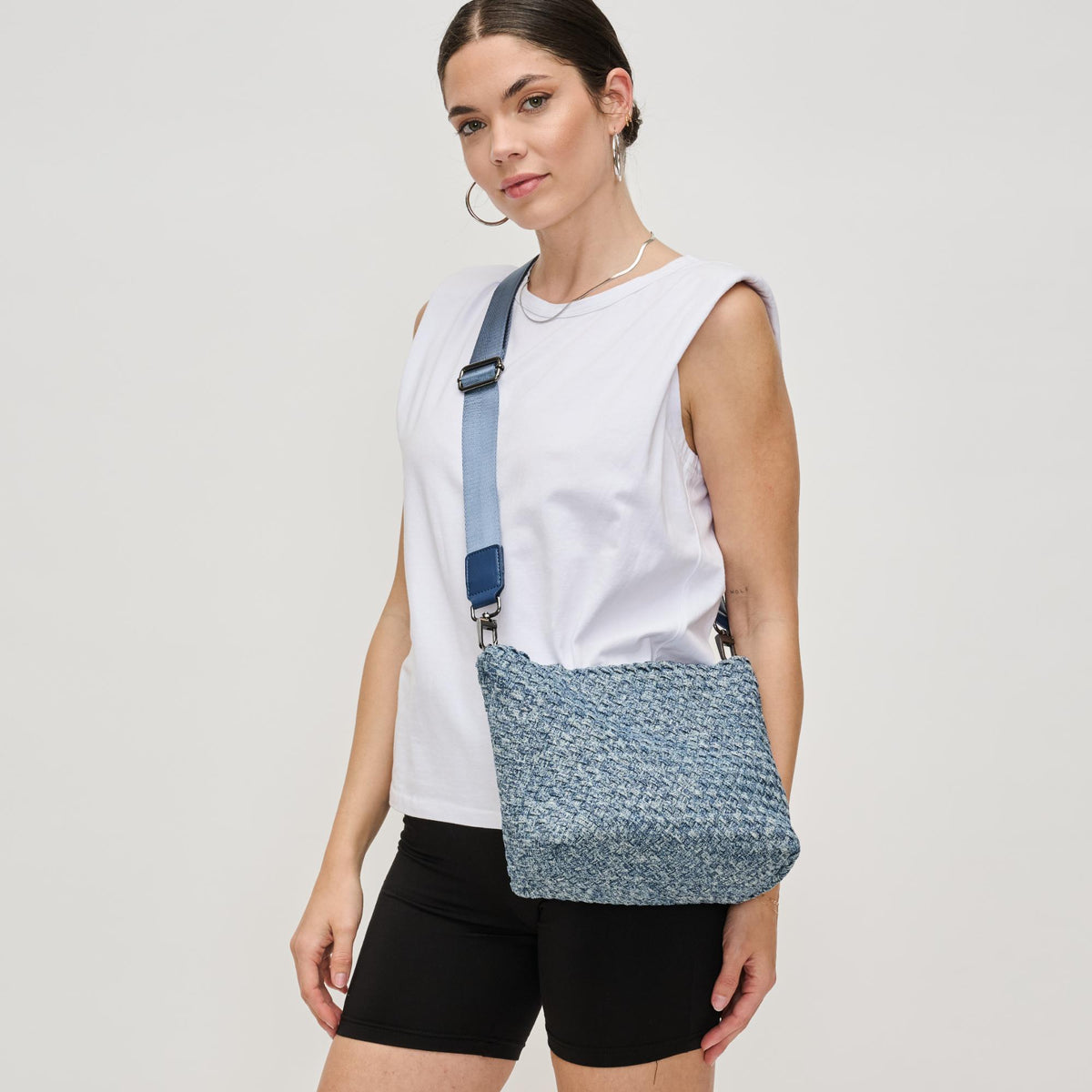 Woman wearing Denim Sol and Selene Sky&#39;s The Limit - Small Denim Crossbody 841764111393 View 1 | Denim