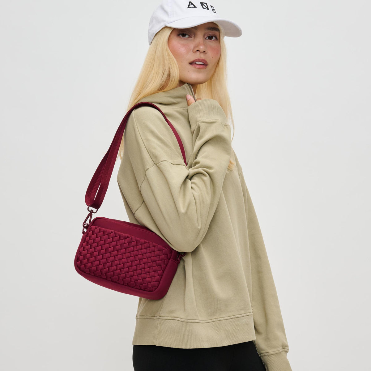 Woman wearing Wine Sol and Selene Inspiration - Woven Neoprene Crossbody 841764110488 View 2 | Wine