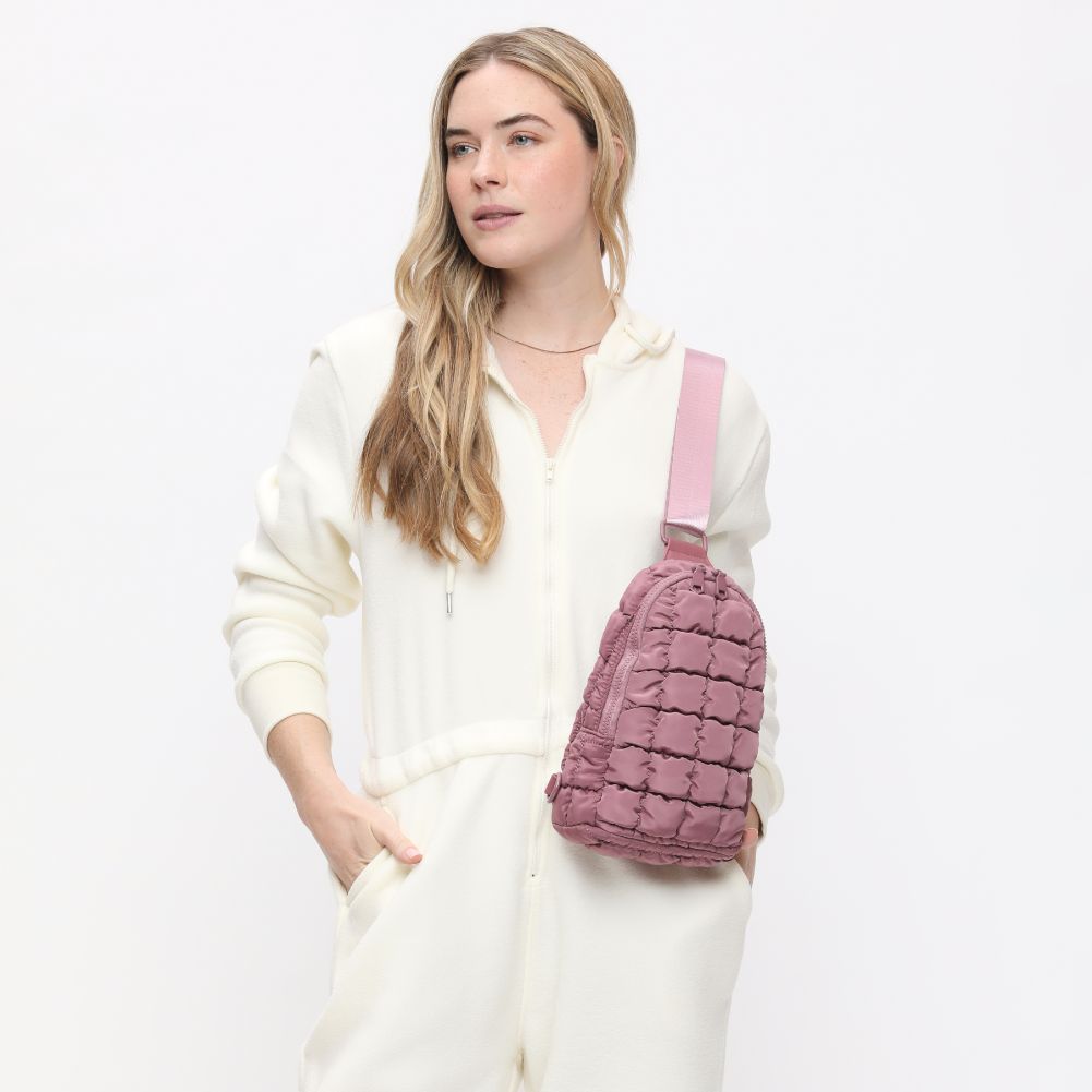 Woman wearing Mauve Sol and Selene Rejuvenate Sling Backpack 841764108676 View 3 | Mauve