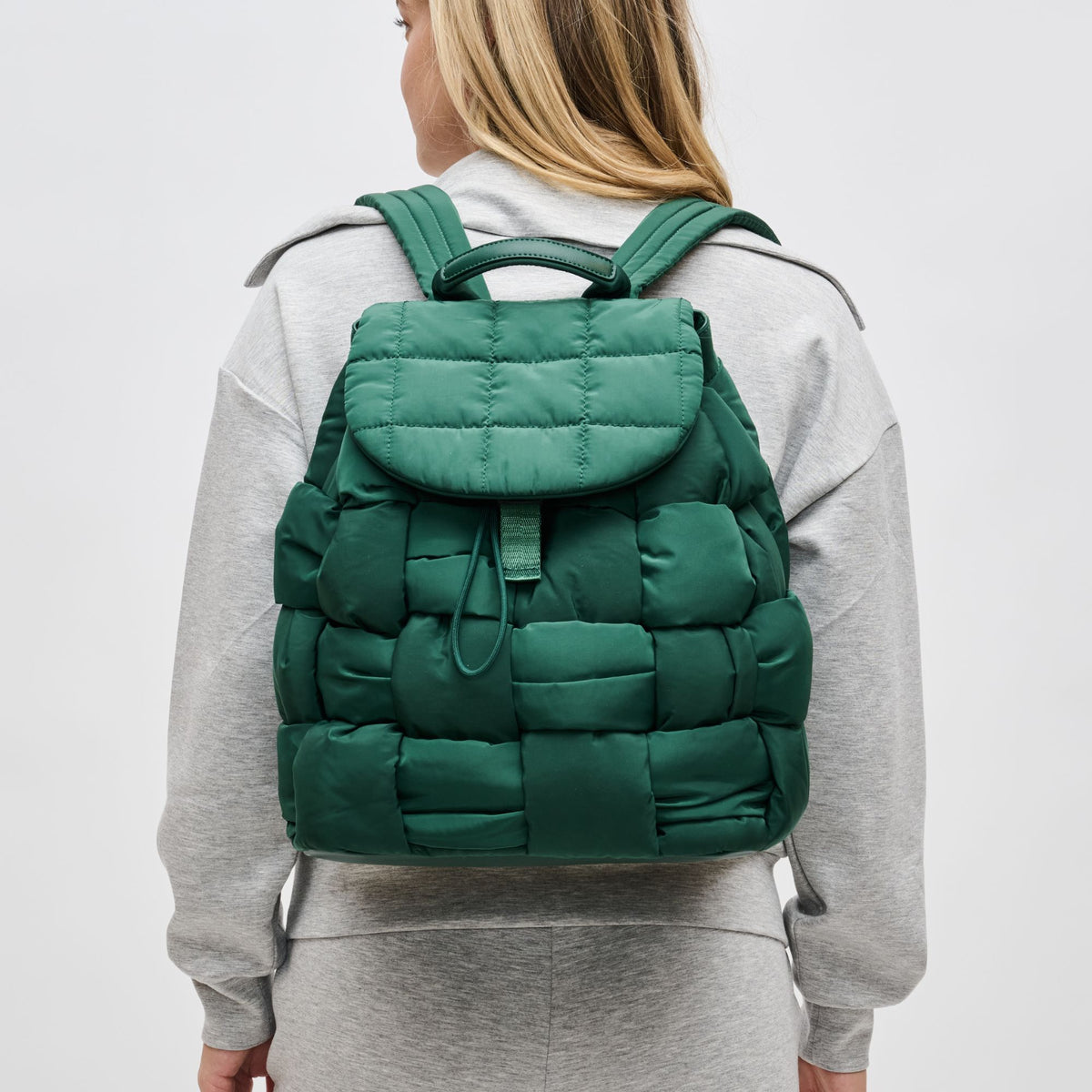 Woman wearing Emerald Sol and Selene Perception Backpack 841764107761 View 1 | Emerald