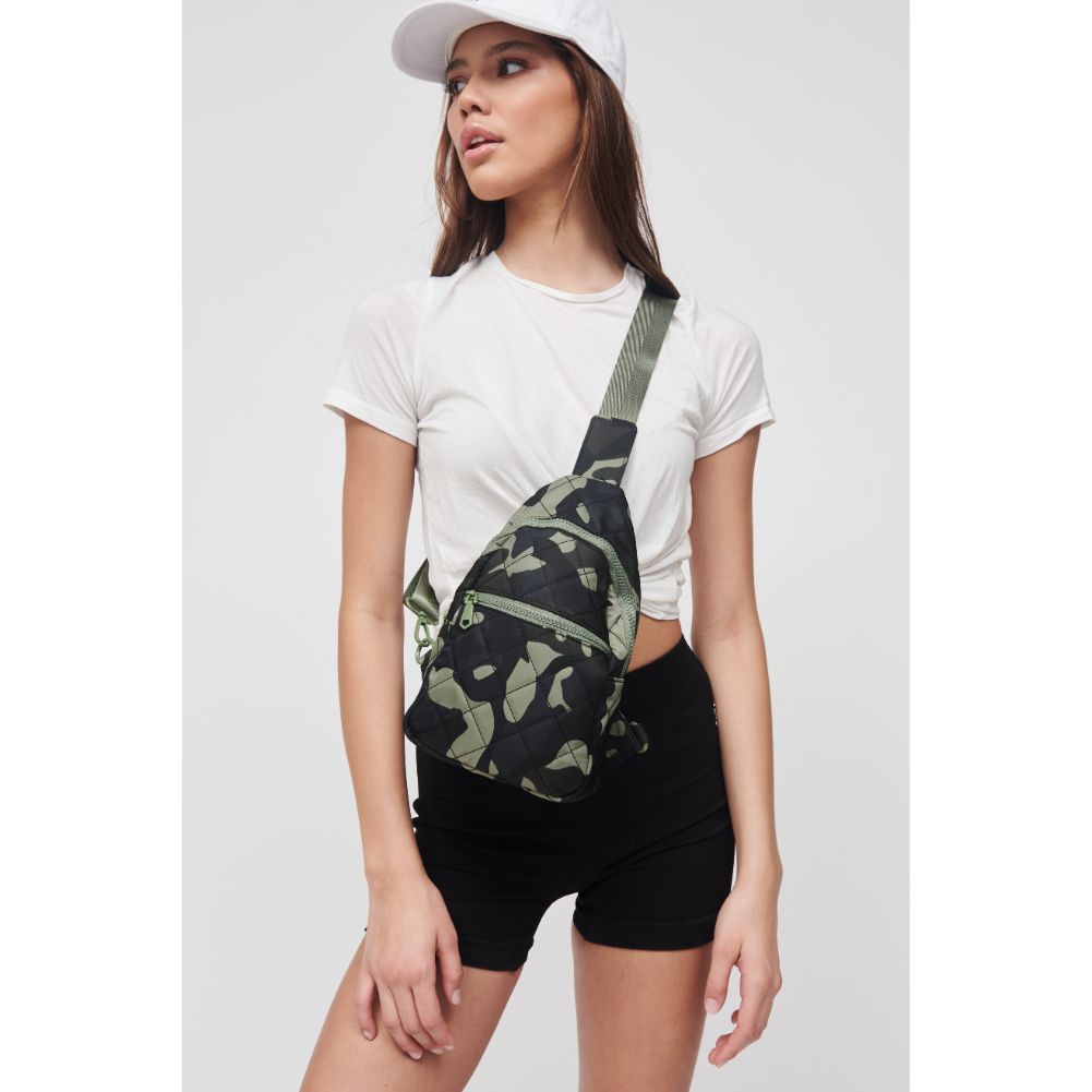 Woman wearing Green Camo Sol and Selene Motivator Sling Backpack 841764106870 View 3 | Green Camo