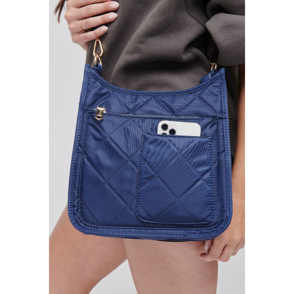 Woman wearing Navy Sol and Selene Motivator Messenger Crossbody 841764106788 View 2 | Navy