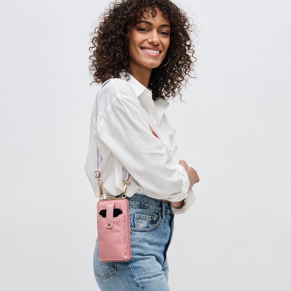 Woman wearing Pastel Pink Sol and Selene Duality Cell Phone Crossbody 840611182289 View 1 | Pastel Pink