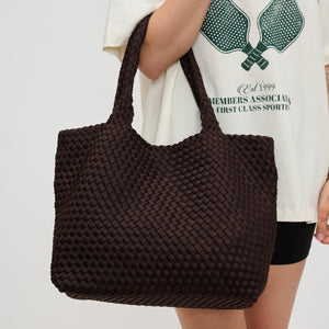 Woman wearing Chocolate Sol and Selene Sky's The Limit - Medium Tote 841764110341 View 1 | Chocolate