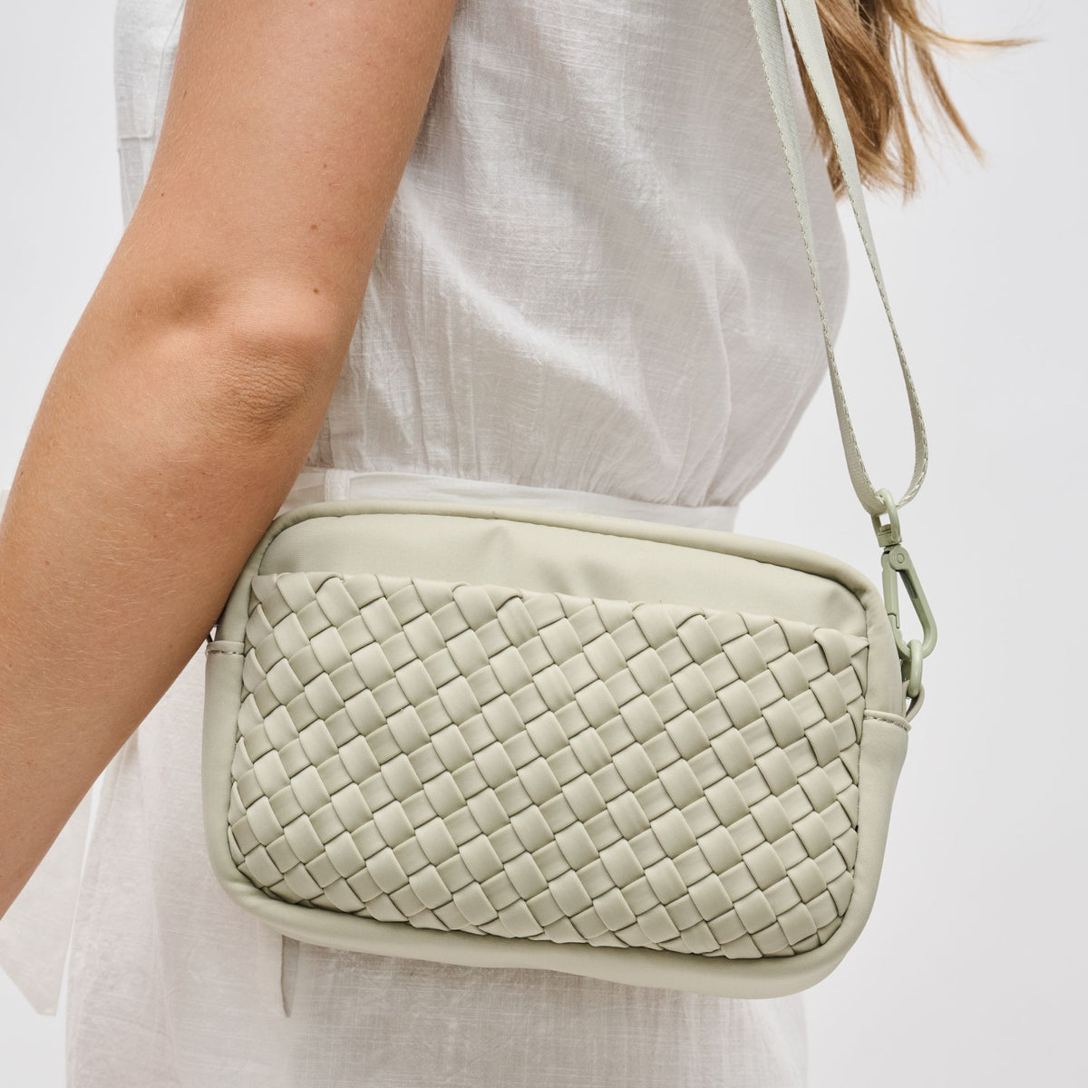 Woman wearing Sage Sol and Selene Inspiration - Woven Neoprene Crossbody 841764109222 View 4 | Sage