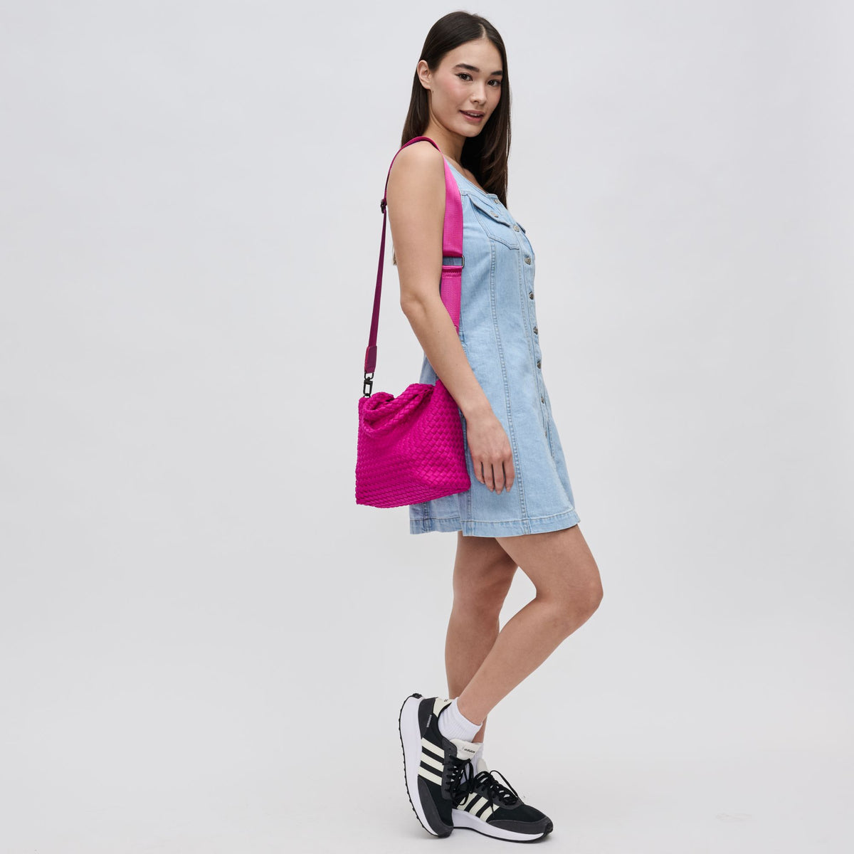 Woman wearing Fuchsia Sol and Selene Sky's The Limit - Small Crossbody 841764108966 View 3 | Fuchsia