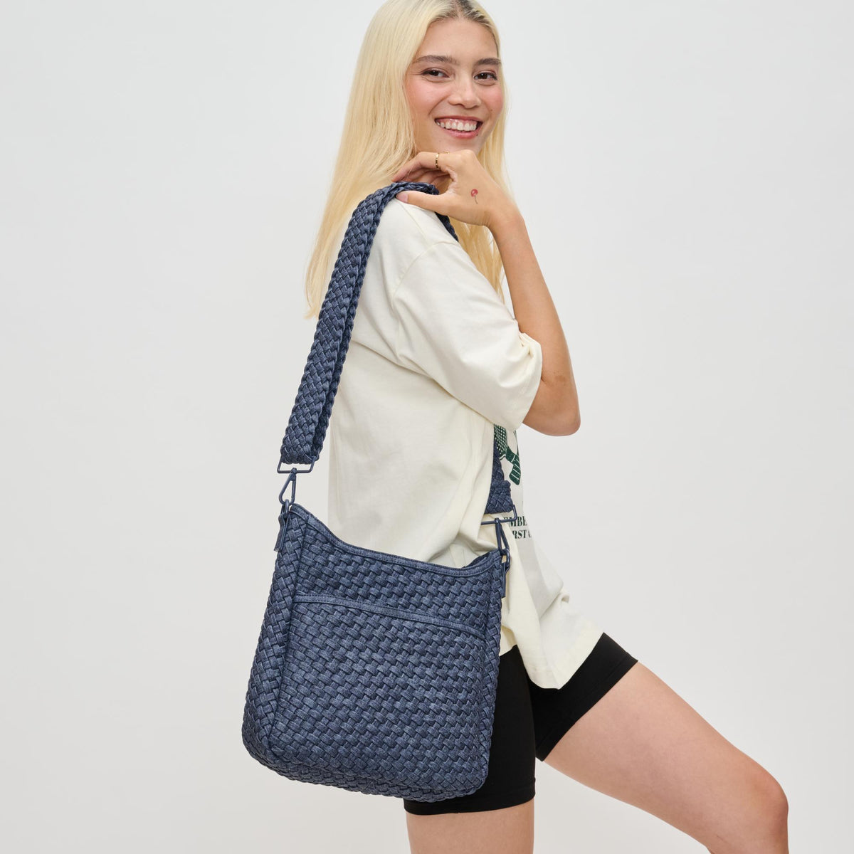 Woman wearing Dark Denim Sol and Selene Kismet - Woven Neoprene Crossbody 841764110198 View 2 | Dark Denim