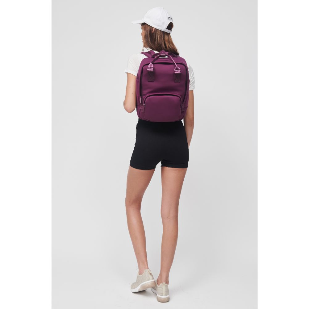 Woman wearing Eggplant Sol and Selene Iconic - Neoprene Backpack 841764106689 View 3 | Eggplant