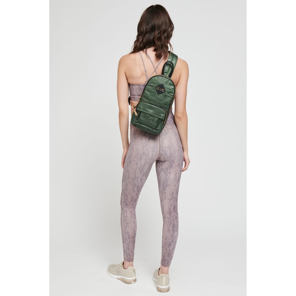 Woman wearing Camo Sol and Selene Hustle Sling Backpack 841764105569 View 2 | Camo