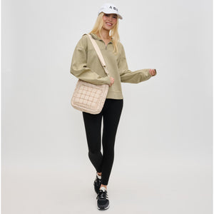 Woman wearing Cream Sol and Selene Aura Crossbody 841764110754 View 2 | Cream