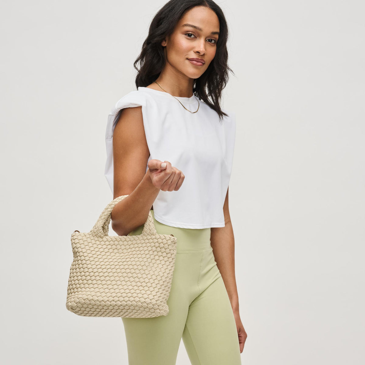 Woman wearing Beige Sol and Selene Sky&#39;s The Limit - Small Sustainable Crossbody 841764111683 View 2 | Beige