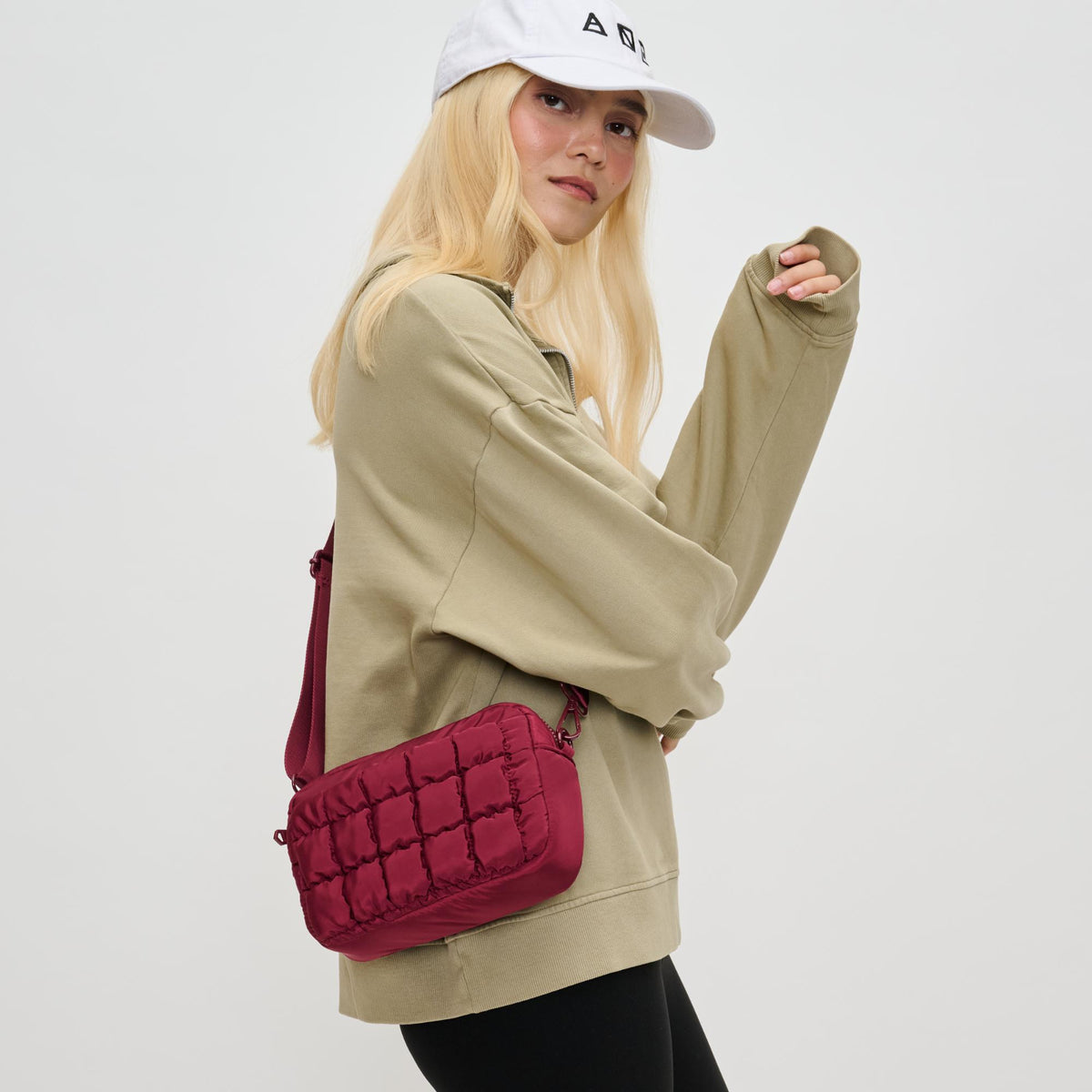 Woman wearing Burgundy Sol and Selene Inspiration - Quilted Nylon Crossbody 841764110594 View 1 | Burgundy