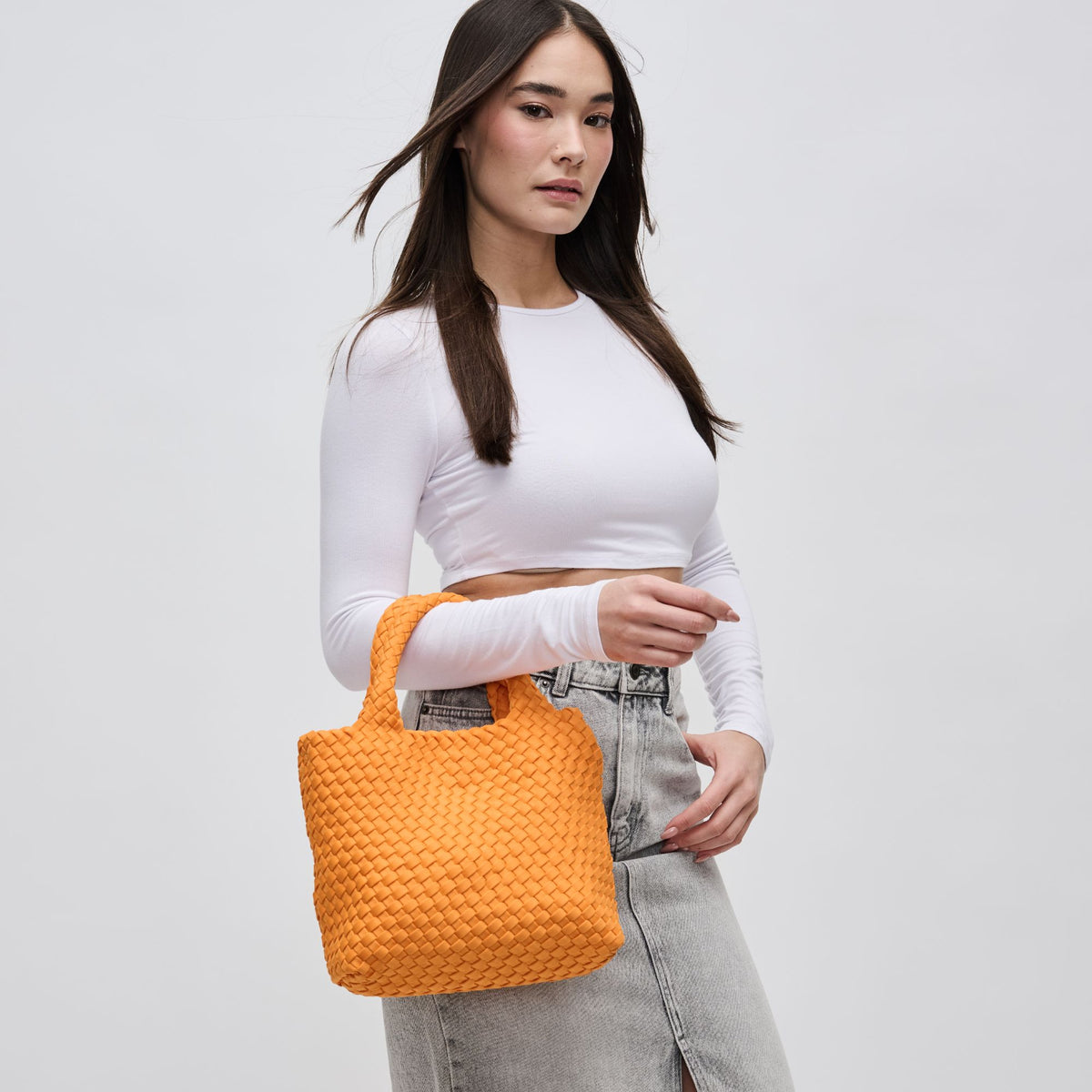 Woman wearing Orange Sol and Selene Sky's The Limit - Small Crossbody 841764109024 View 1 | Orange