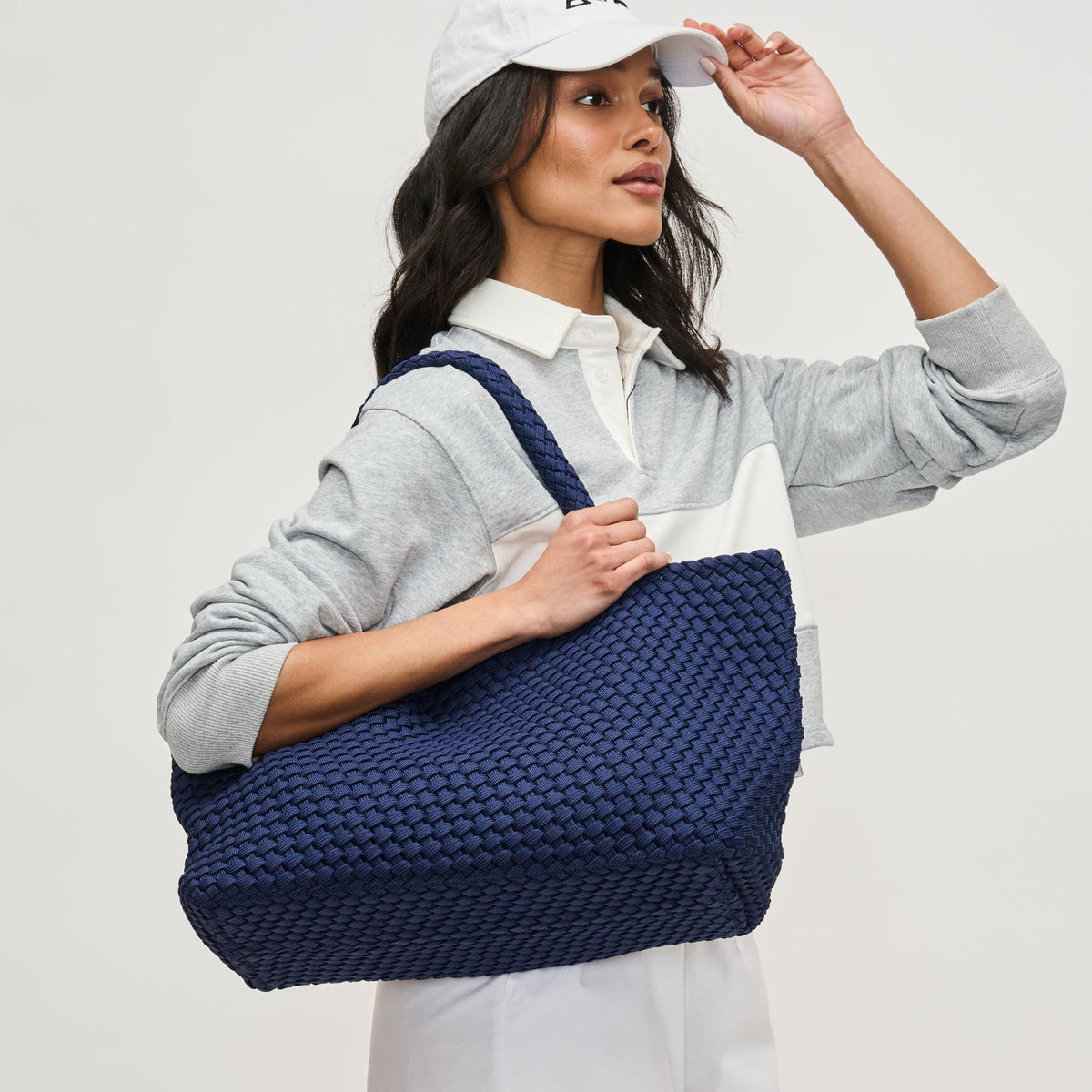 Woman wearing Navy Sol and Selene Sky&#39;s The Limit - Large Sustainable Tote 841764111560 View 4 | Navy