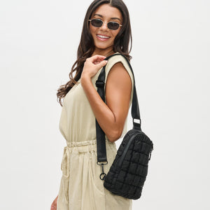 Woman wearing Black Sol and Selene Rejuvenate Sling Backpack 841764108621 View 3 | Black