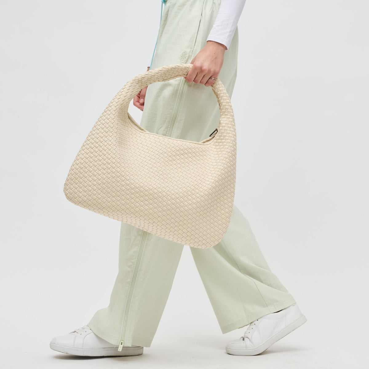 Woman wearing Cream Sol and Selene Dare to Dream - Large Woven Neoprene Hobo 841764110921 View 2 | Cream