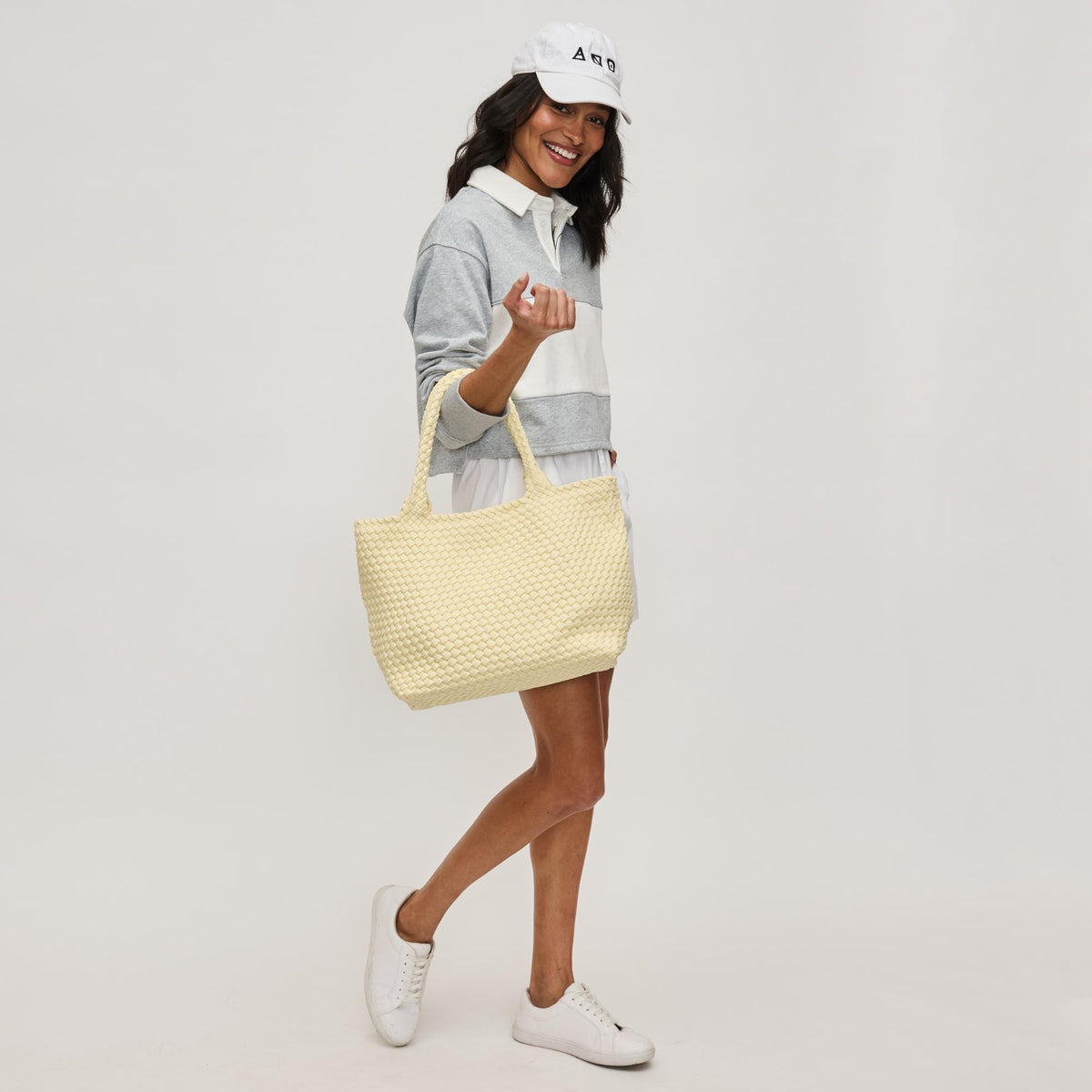 Woman wearing Butter Sol and Selene Sky&#39;s The Limit - Medium Sustainable Tote 841764111607 View 2 | Butter