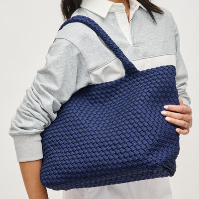 Woman wearing Navy Sol and Selene Sky's The Limit - Medium Sustainable Tote 841764111614 View 1 | Navy