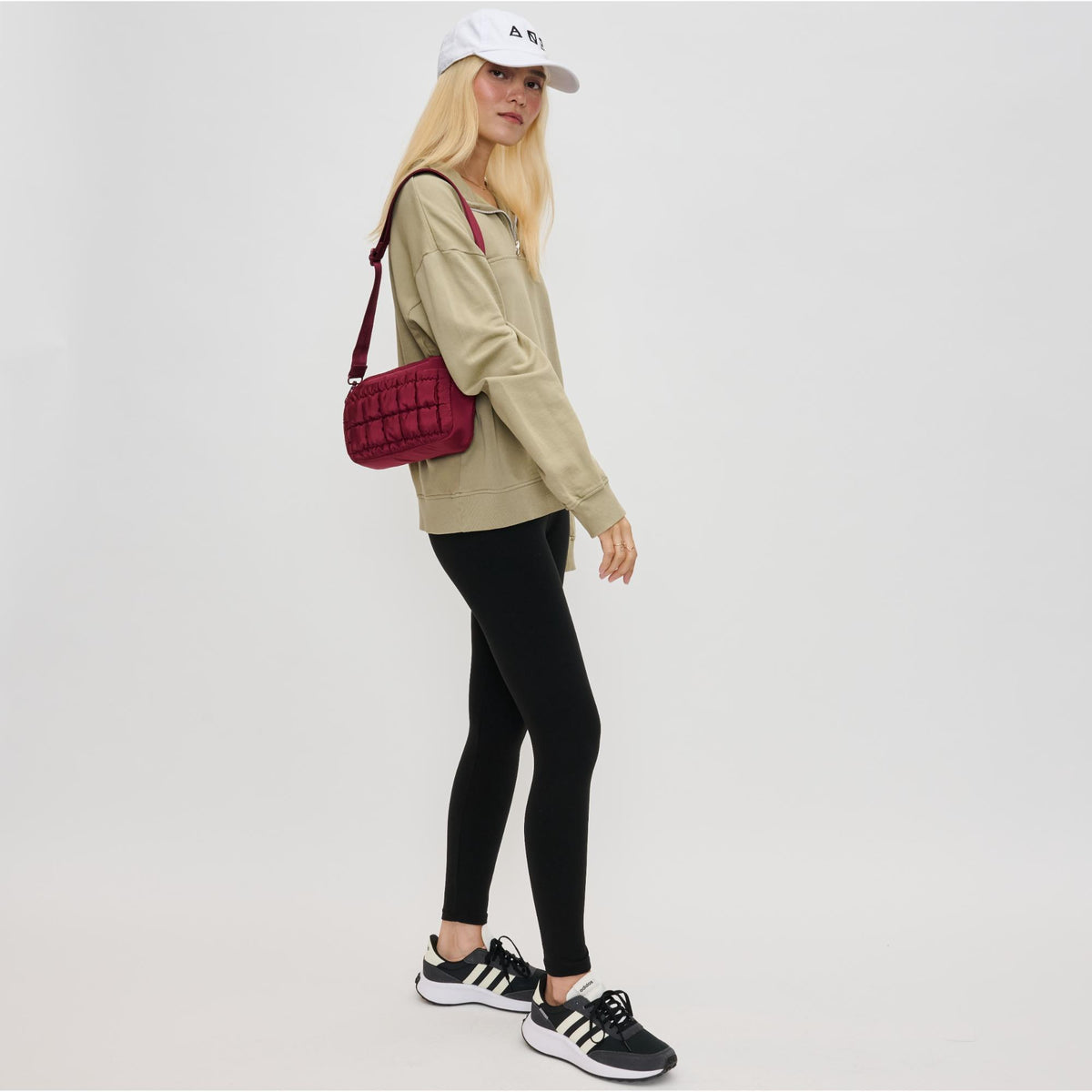 Woman wearing Burgundy Sol and Selene Inspiration - Quilted Nylon Crossbody 841764110594 View 3 | Burgundy