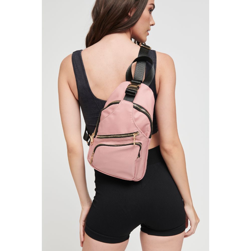Woman wearing Pastel Pink Sol and Selene On The Go - Nylon Sling Backpack 841764106276 View 1 | Pastel Pink
