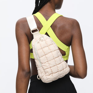 Woman wearing Cream Sol and Selene Rejuvenate Sling Backpack 841764108652 View 1 | Cream