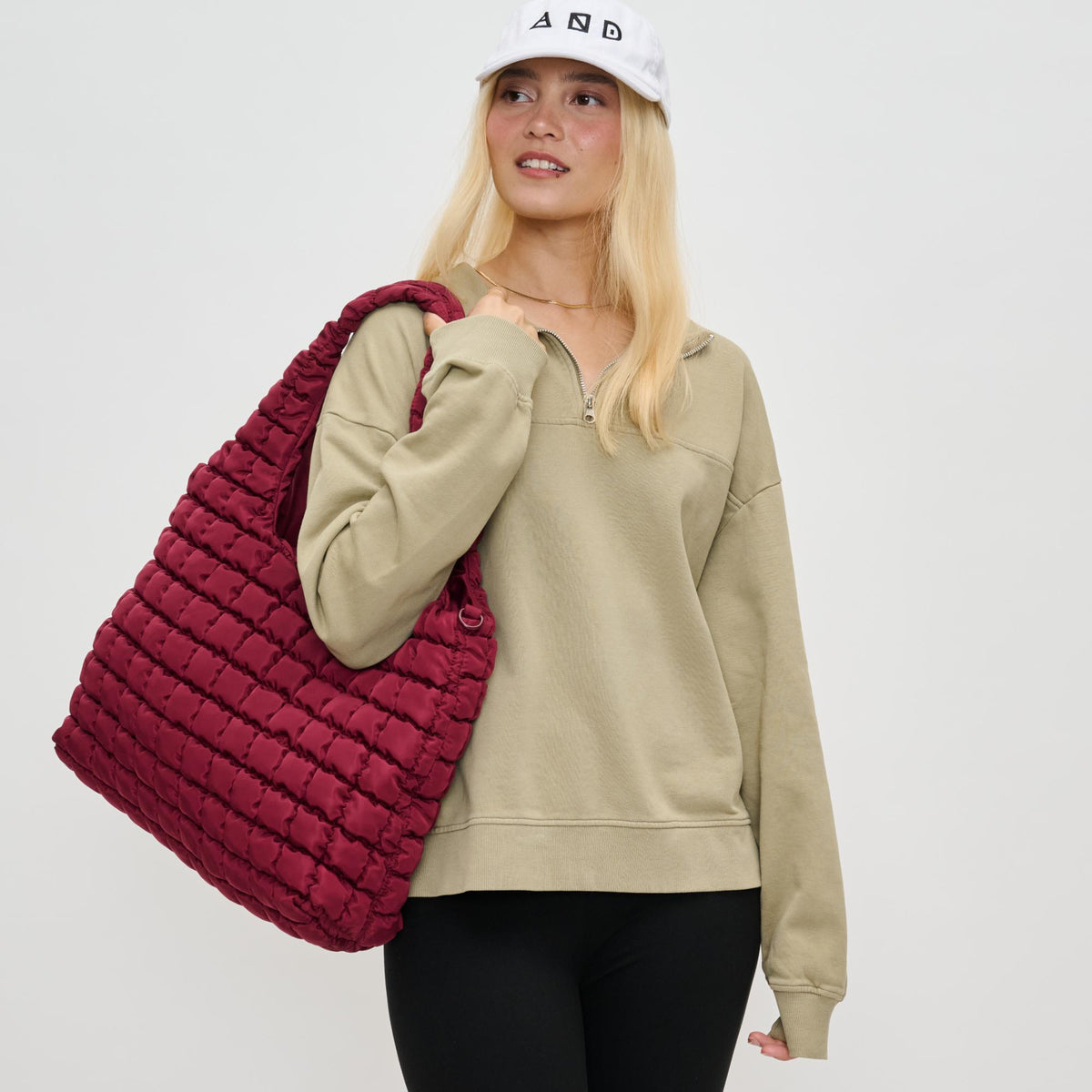 Woman wearing Burgundy Sol and Selene Elevate Hobo 841764110549 View 1 | Burgundy