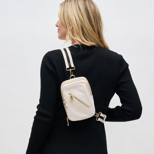 Woman wearing Cream Sol and Selene Accolade Sling Backpack 841764109369 View 1 | Cream