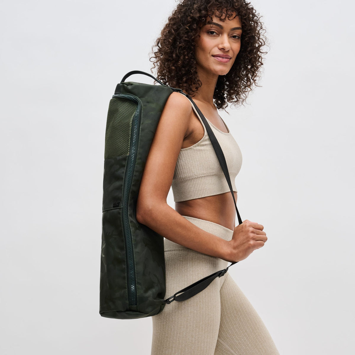 Woman wearing Olive Camo Sol and Selene Karma - Camo Print Yoga Mat Bag 841764100816 View 3 | Olive Camo