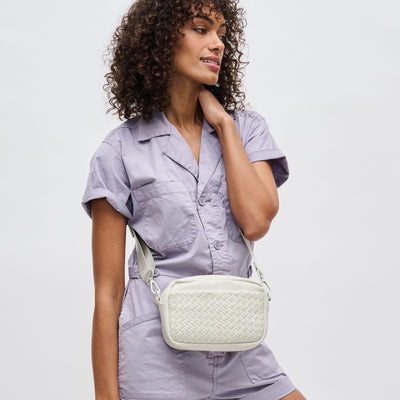 Woman wearing Bone Sol and Selene Inspiration - Woven Neoprene Crossbody 841764109215 View 1 | Bone