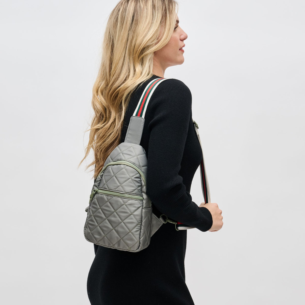 Woman wearing Sage Sol and Selene Motivator Sling Backpack 841764107532 View 2 | Sage