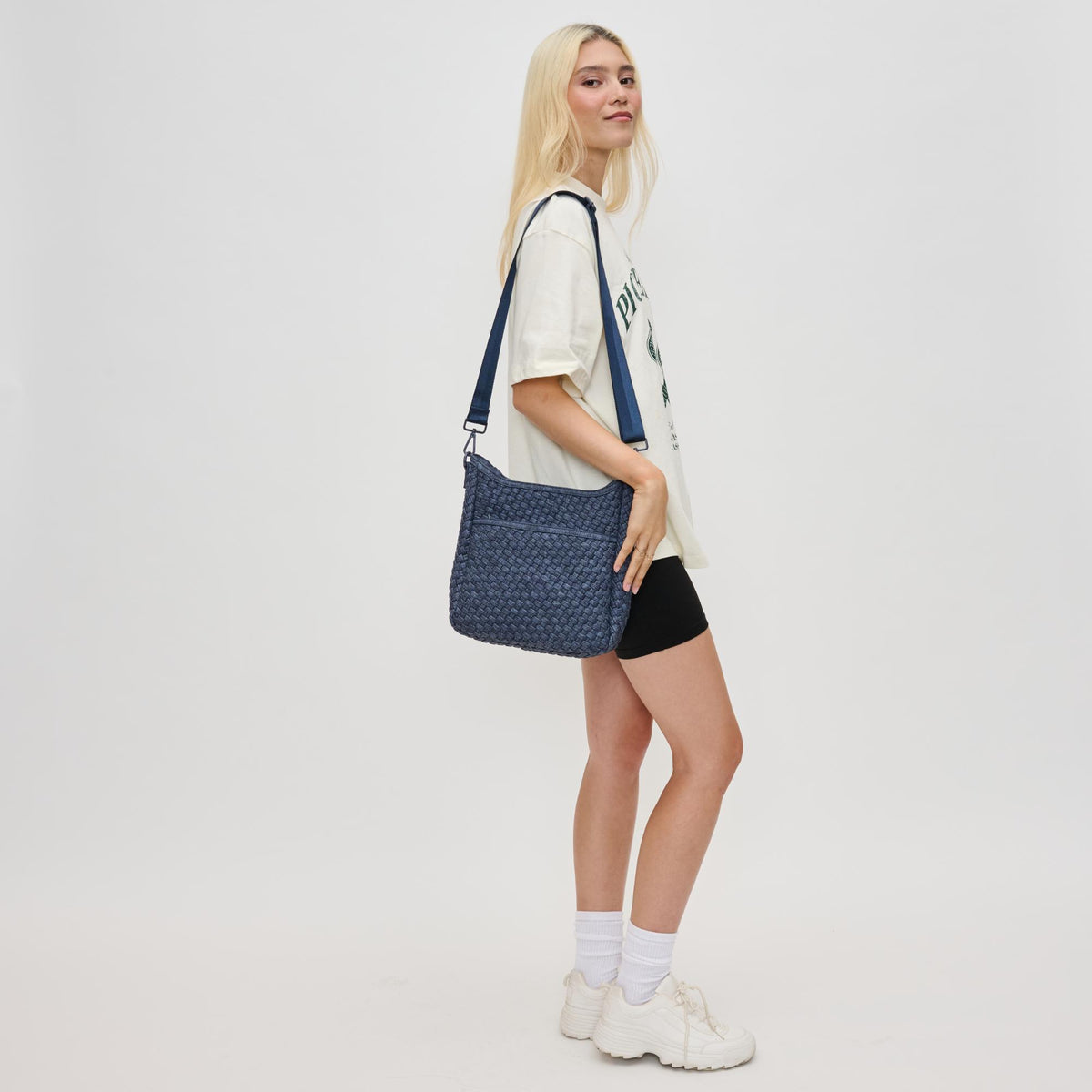 Woman wearing Dark Denim Sol and Selene Kismet - Woven Neoprene Crossbody 841764110198 View 3 | Dark Denim