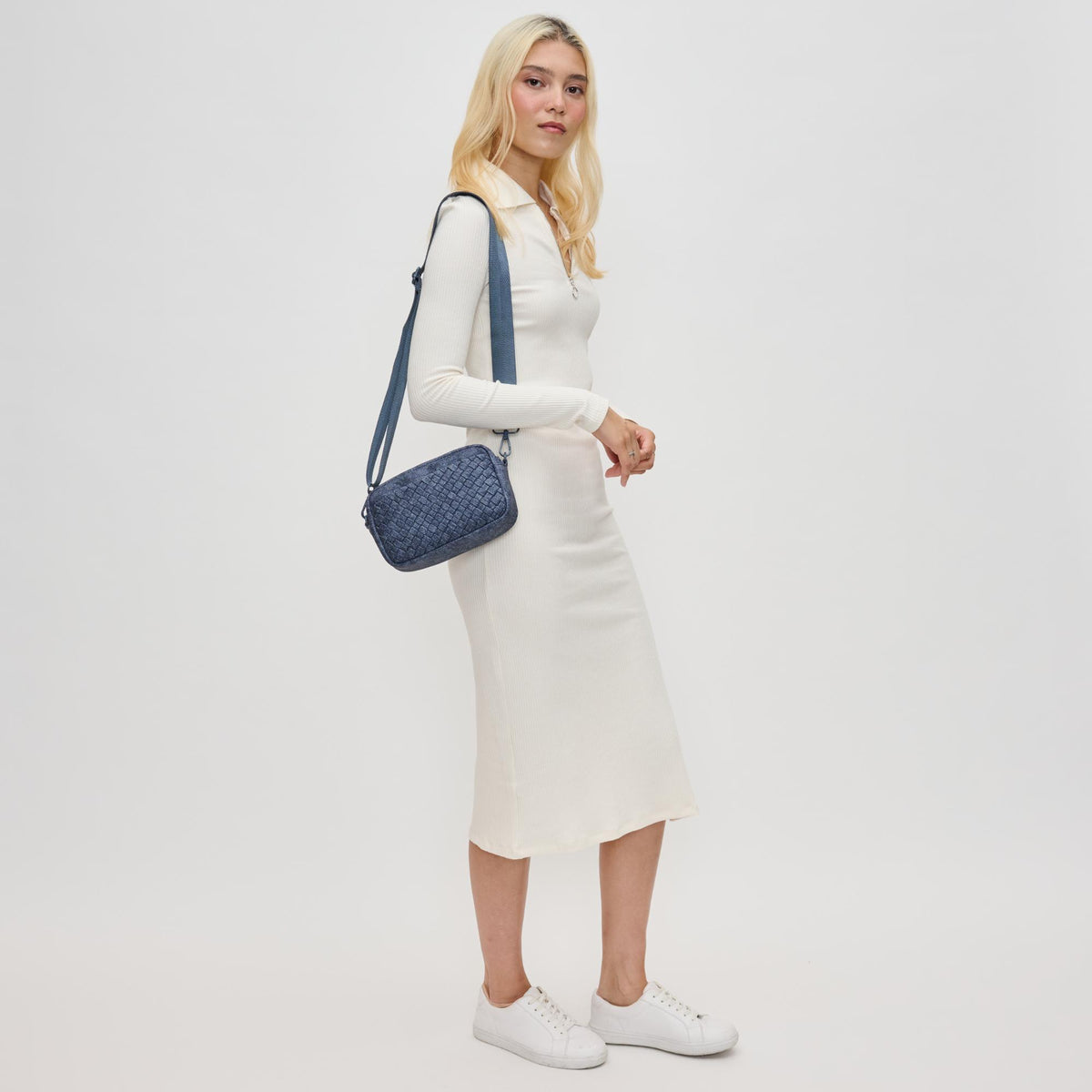 Woman wearing Dark Denim Sol and Selene Inspiration - Woven Neoprene Crossbody 841764110501 View 3 | Dark Denim