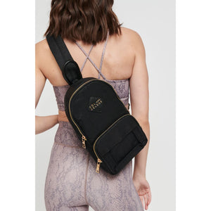 Woman wearing Black Sol and Selene Hustle Sling Backpack 841764106559 View 1 | Black