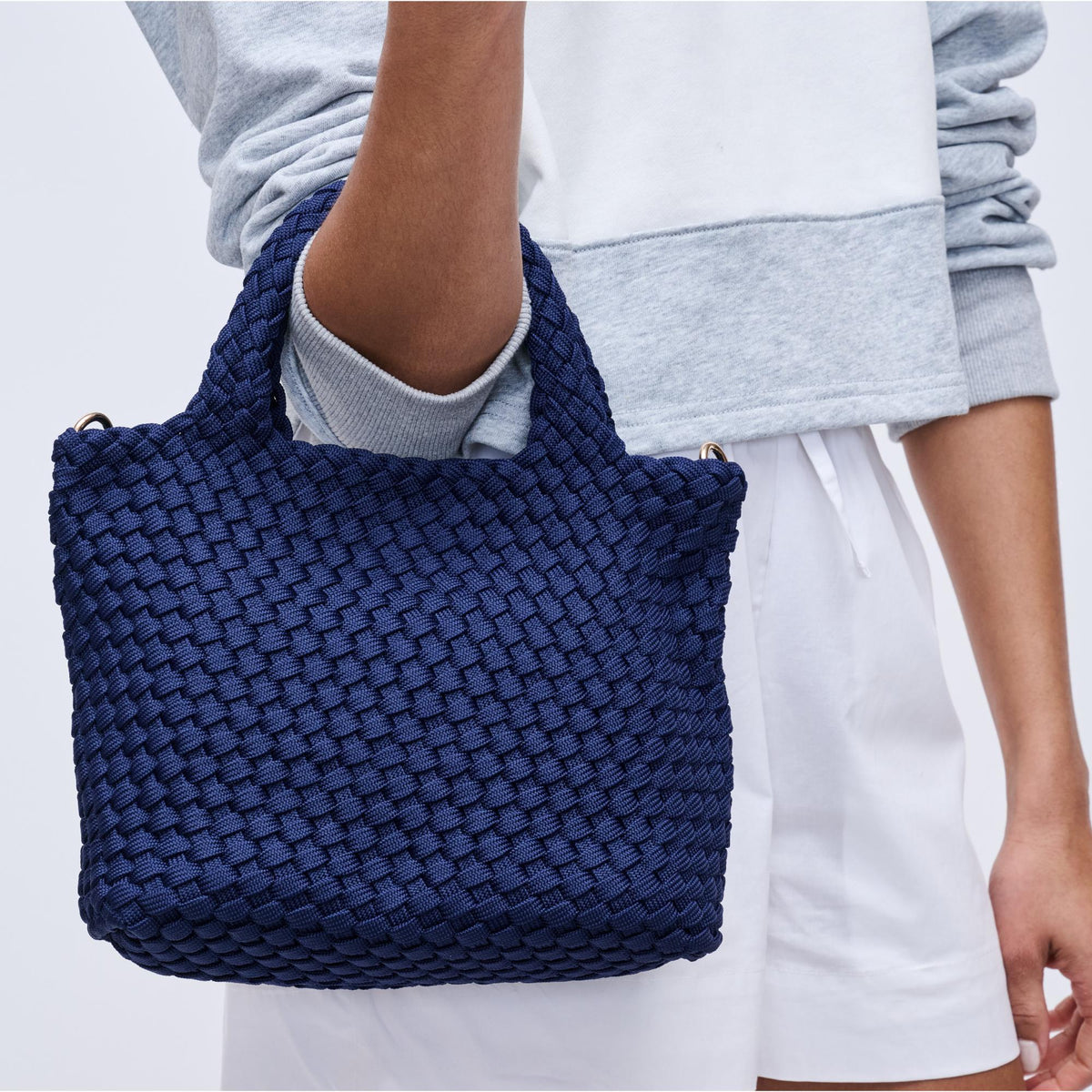 Woman wearing Navy Sol and Selene Sky&#39;s The Limit - Small Sustainable Crossbody 841764111720 View 4 | Navy