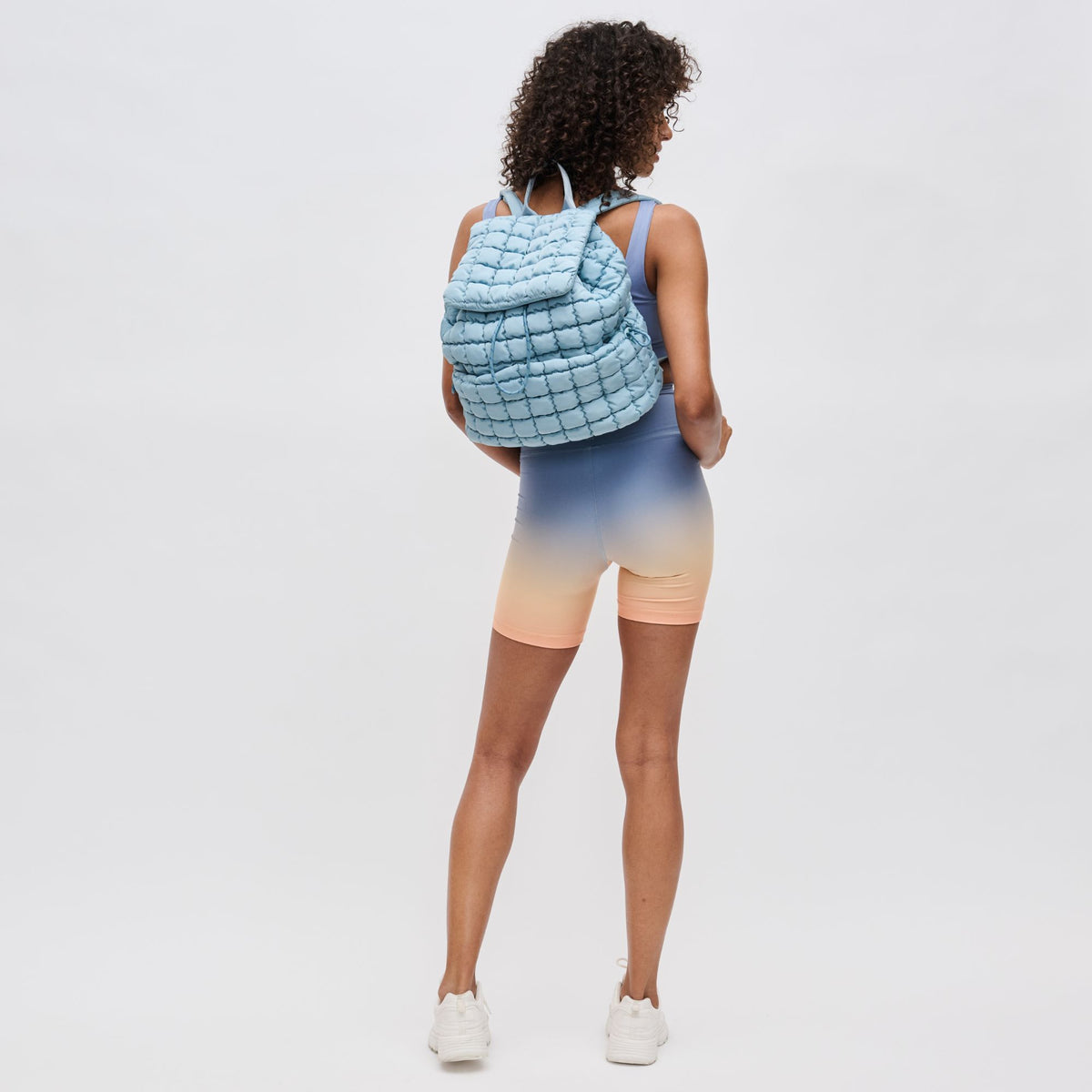 Woman wearing Sky Blue Sol and Selene Vitality Backpack 841764109499 View 3 | Sky Blue