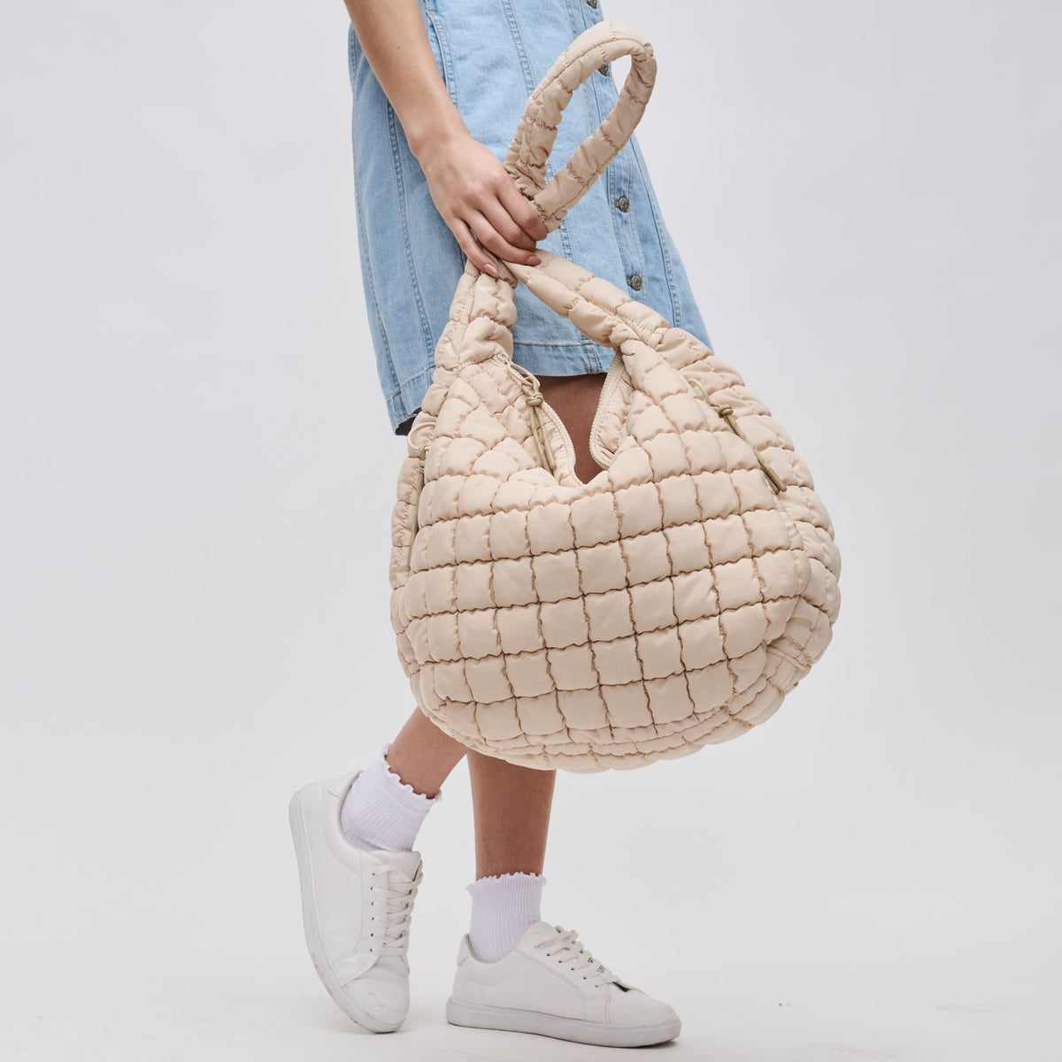 Woman wearing Cream Sol and Selene Revive Hobo 841764109512 View 4 | Cream