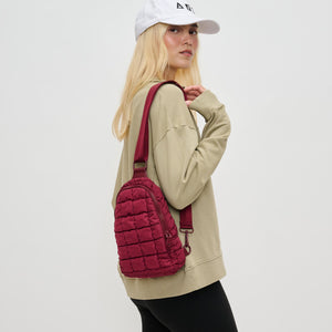 Woman wearing Burgundy Sol and Selene Rejuvenate Sling Backpack 841764110716 View 1 | Burgundy