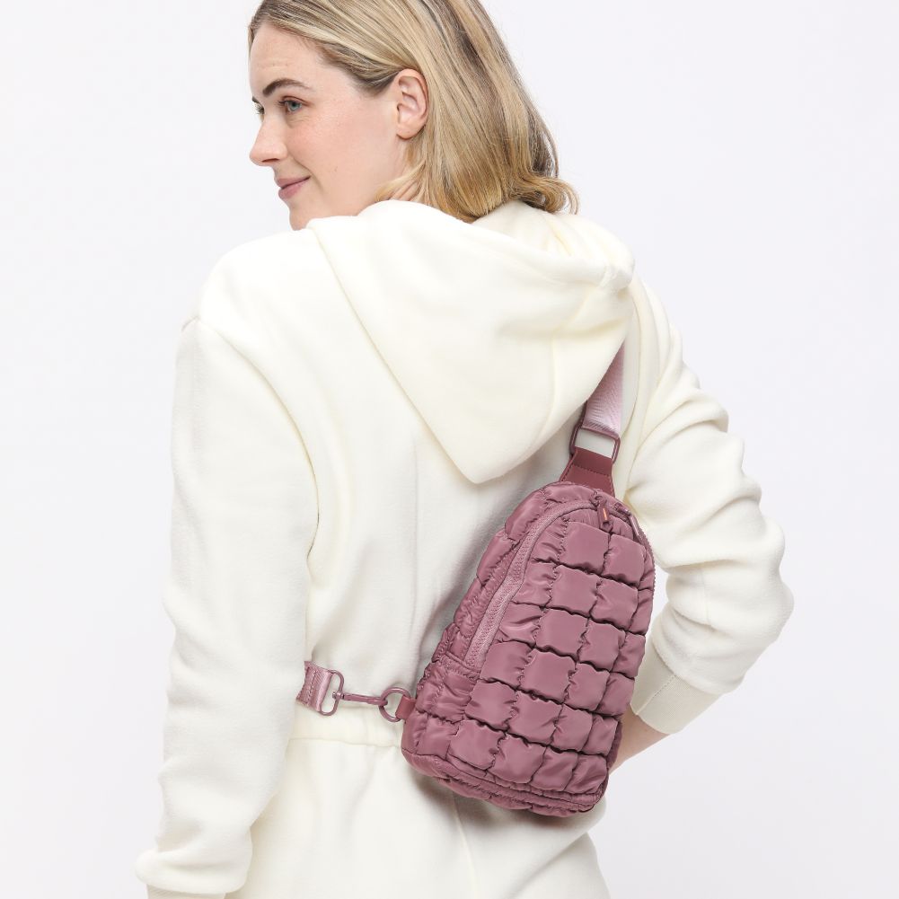 Woman wearing Mauve Sol and Selene Rejuvenate Sling Backpack 841764108676 View 4 | Mauve