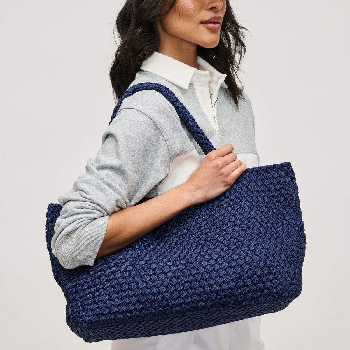 Woman wearing Navy Sol and Selene Sky&#39;s The Limit - Large Sustainable Tote 841764111560 View 1 | Navy