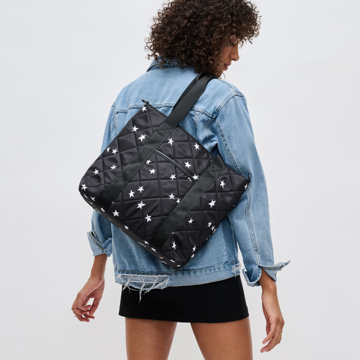 Woman wearing Black Star Sol and Selene Motivator Carryall Tote 841764106931 View 1 | Black Star