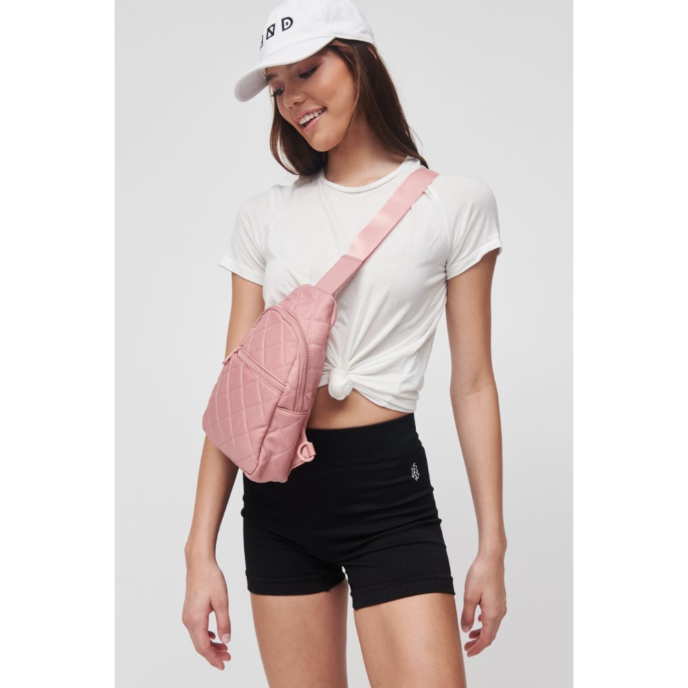 Woman wearing Pastel Pink Sol and Selene Motivator Sling Backpack 841764106863 View 4 | Pastel Pink