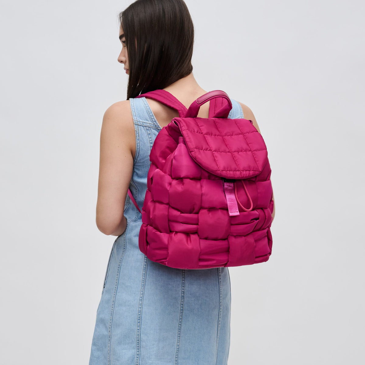 Woman wearing Magenta Sol and Selene Perception Backpack 841764107945 View 2 | Magenta