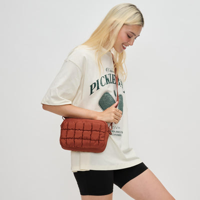 Woman wearing Rust Sol and Selene Inspiration - Quilted Nylon Crossbody 841764110600 View 1 | Rust