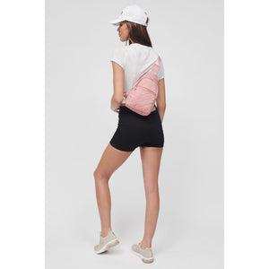 Woman wearing Pastel Pink Sol and Selene Motivator Sling Backpack 841764106863 View 2 | Pastel Pink