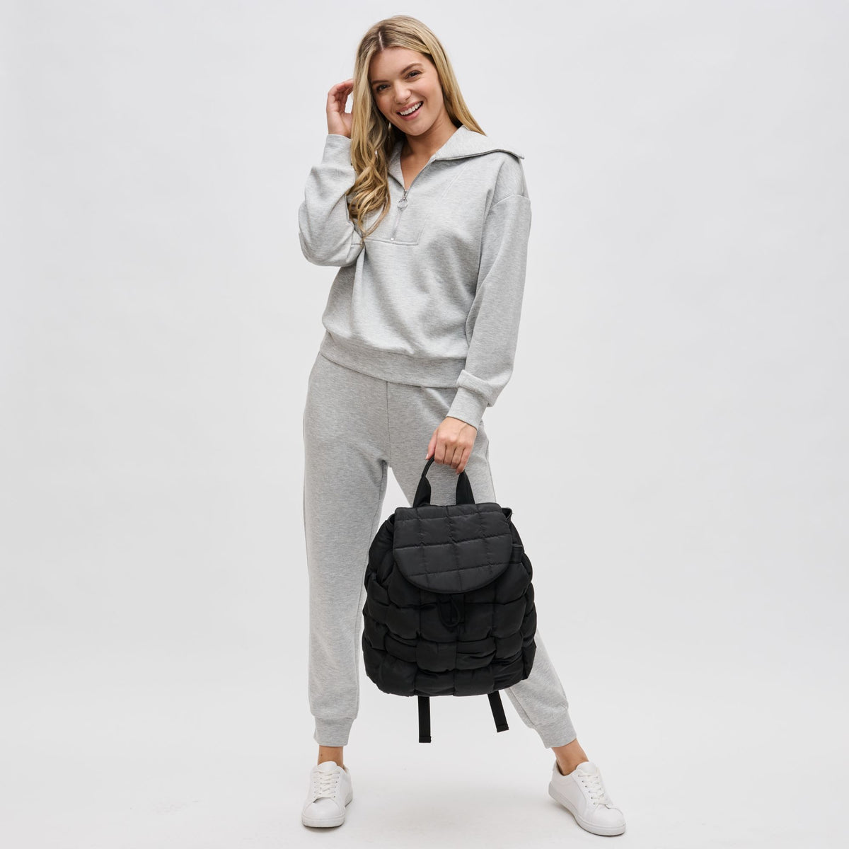 Woman wearing Black Sol and Selene Perception Backpack 841764107730 View 4 | Black