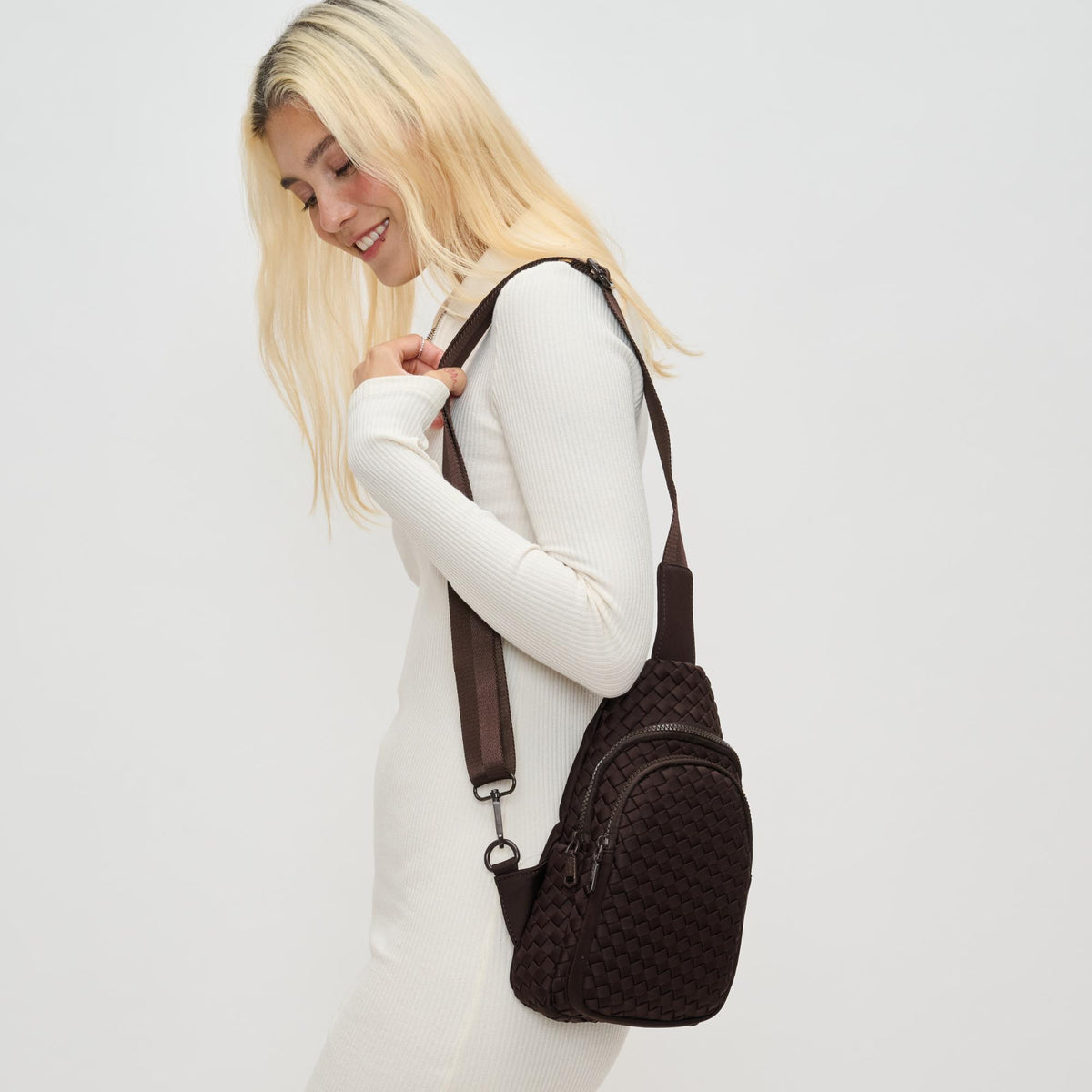 Woman wearing Chocolate Sol and Selene Beyond The Horizon - Woven Neoprene Sling Backpack 841764110440 View 2 | Chocolate