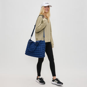 Woman wearing Navy Sol and Selene Elevate Hobo 841764110556 View 3 | Navy