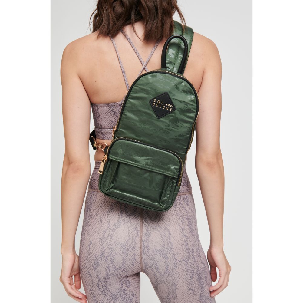 Woman wearing Camo Sol and Selene Hustle Sling Backpack 841764105569 View 1 | Camo